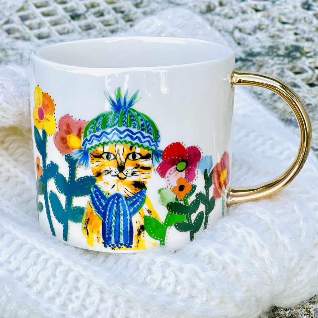 Mugg med guldöra ?Kattis?